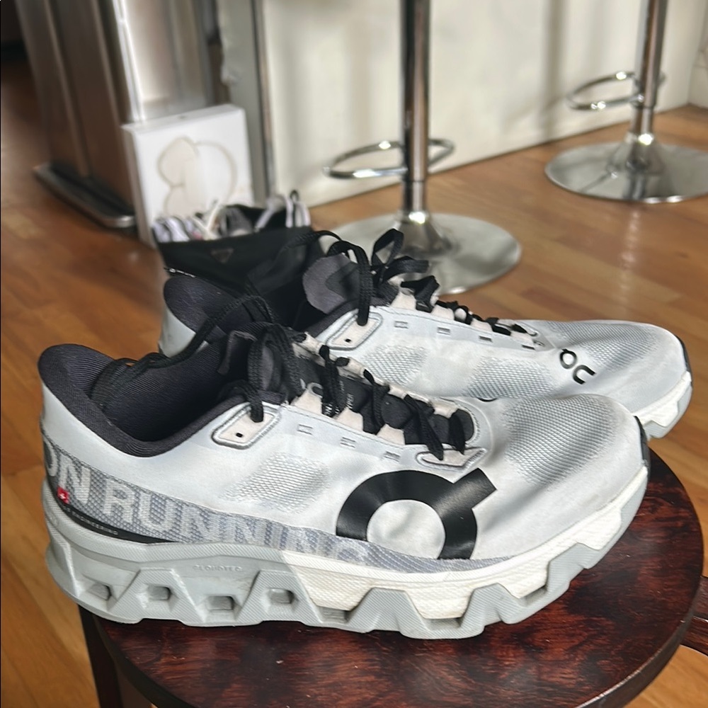 On Running Gray and Black Athletic Shoes